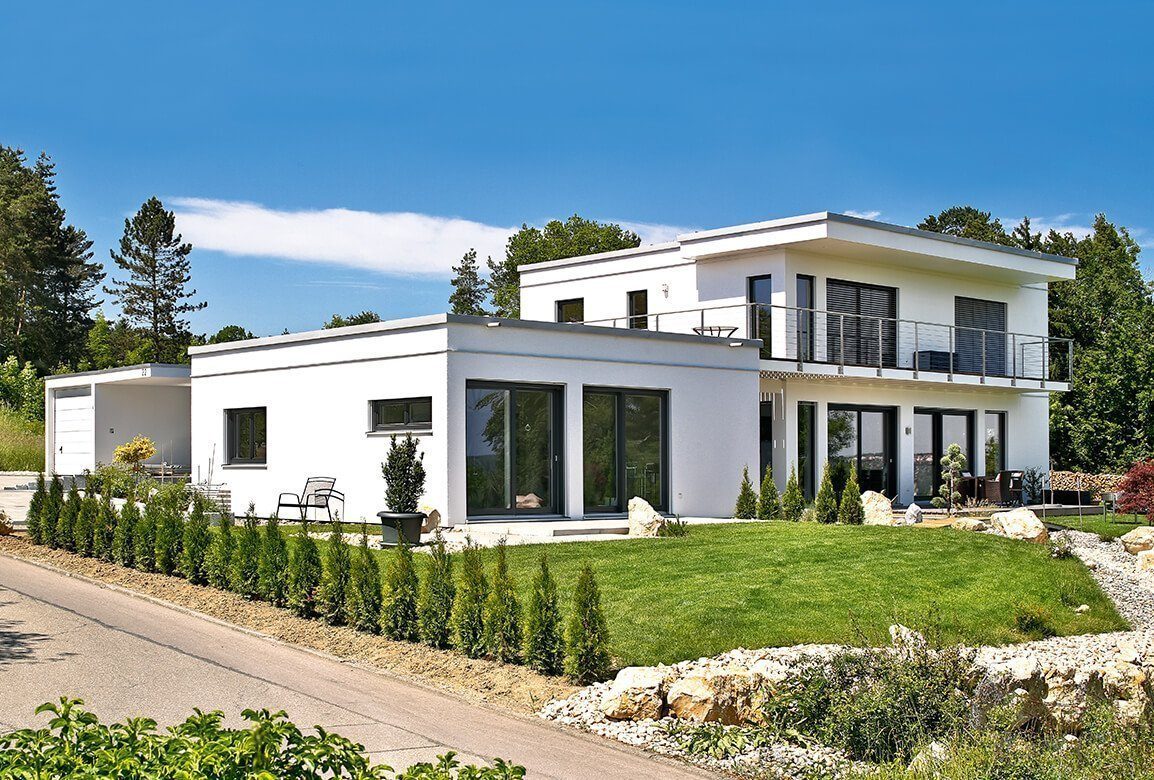 Vitalhaus Sigmaringen - Ein haus mit büschen vor einem gebäude - Haus