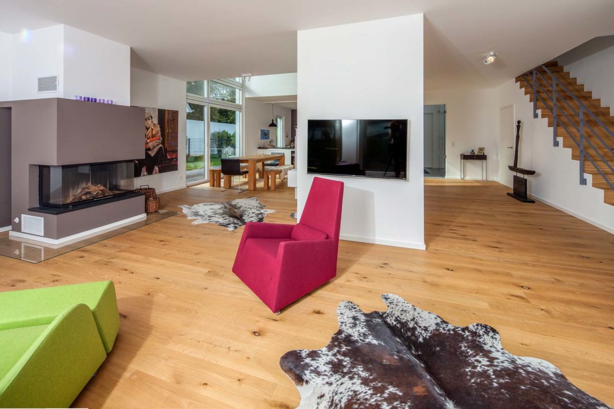 Haus Hildebrand - Ein Wohnzimmer mit Möbeln und einem Fernseher - Haus