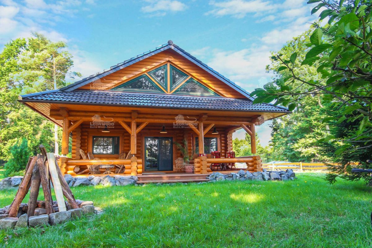 Haus Elch - Ein Garten vor einem Gebäude - Holzhaus