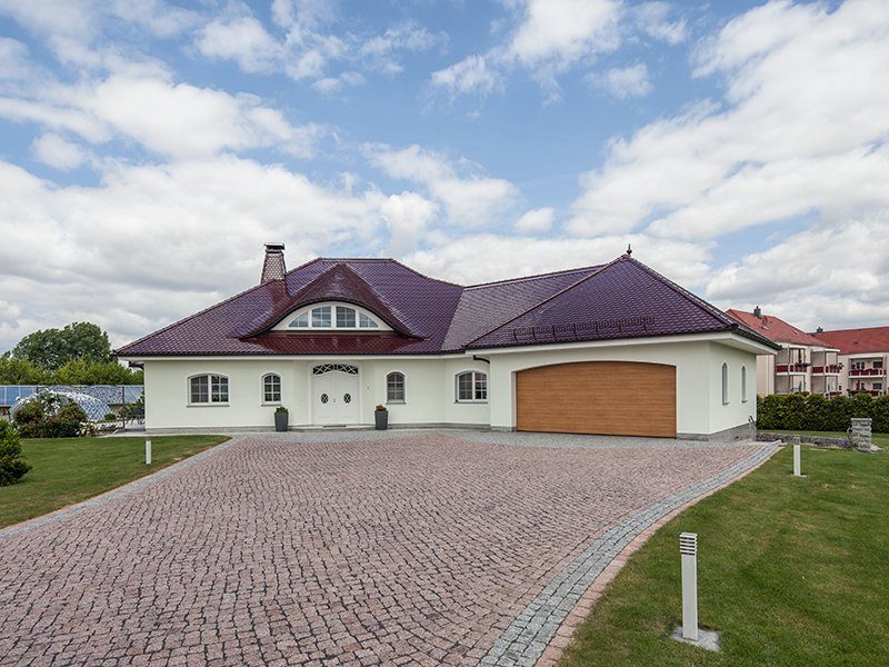 Haus Mühlberger - Ein kleines haus im hintergrund - Haus