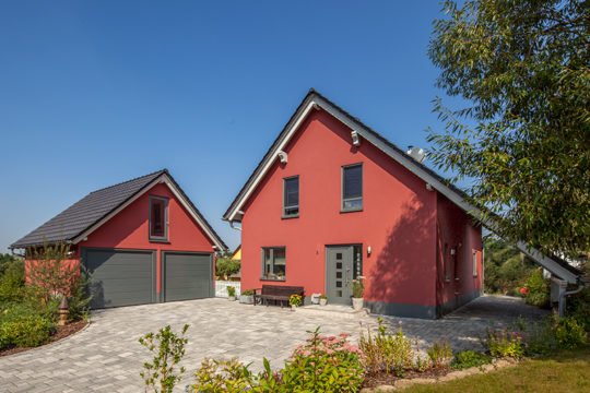 Haus Urban - Ein Haus mit einem roten Backsteingebäude - Haus