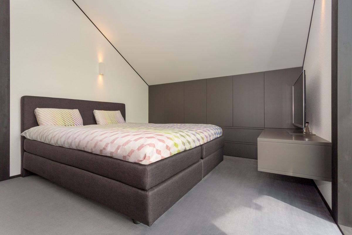 HUF Haus Modum 8 - Ein Schlafzimmer mit einem Bett in einem Raum - Bettrahmen