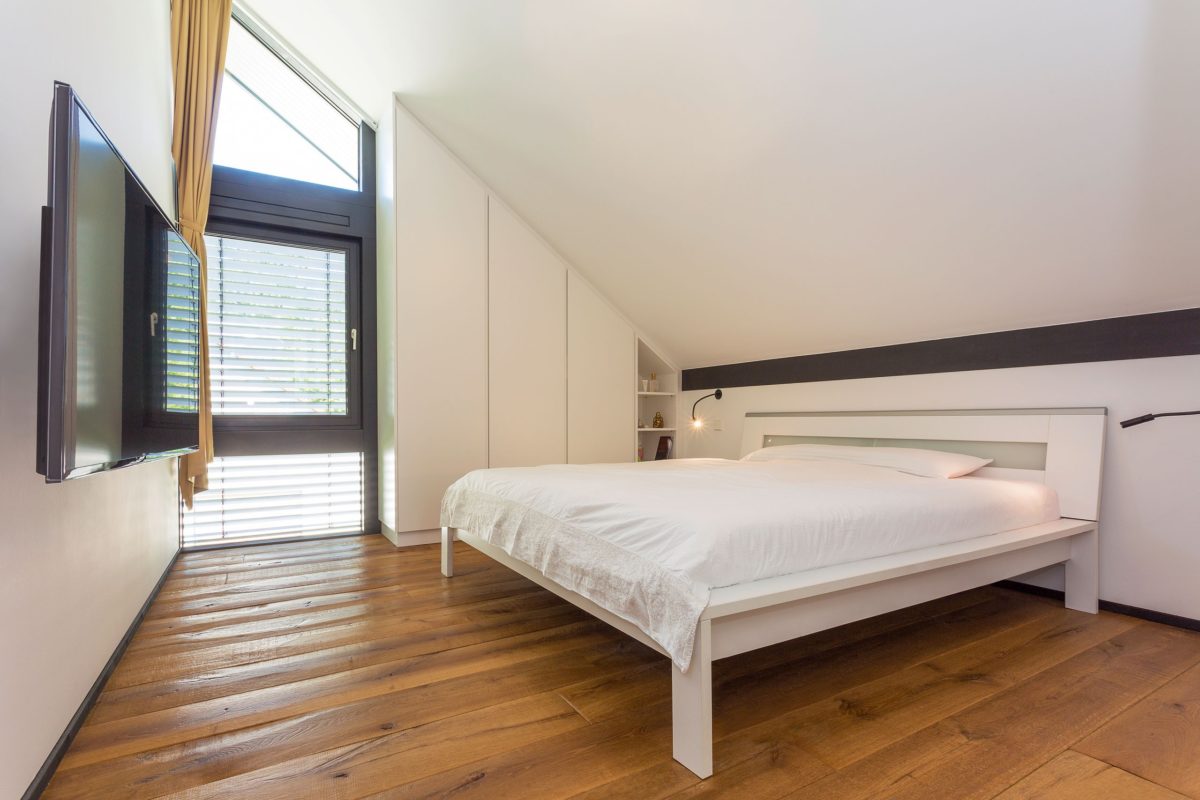 HUF Haus Modum 6 - Ein Schlafzimmer mit einem Bett in einem Raum - Bettrahmen