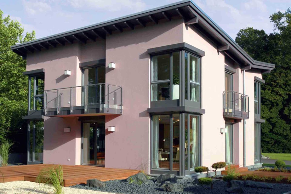 BRAVUR 550 – Musterhaus Bad Vilbel - Ein Haus mit Bäumen im Hintergrund - Bad Vilbel
