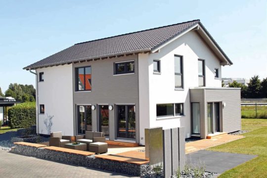 Musterhaus Hannover – NEO 300 - Ein kleines haus im hintergrund - FingerHaus