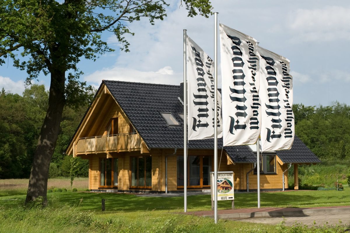 Holzhaus Barkhof - Ein schild vor einem haus - Holzhaus
