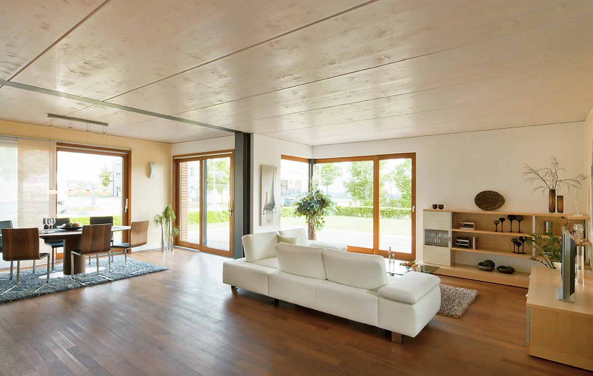 Musterhaus Kaarst - Ein Wohnzimmer mit Möbeln und einem großen Fenster - IKEA Kerze