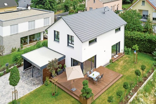 Haus Zwingenberg - Ein Haus mit Bäumen im Hintergrund - Haus