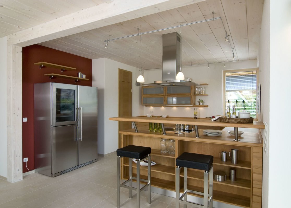 Design 168 - Eine Küche mit einem Esstisch - Frammelsberger GmbH