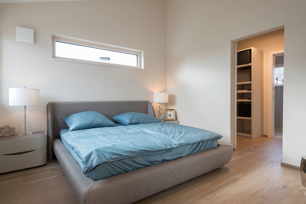 Griffner Classic München - Ein Schlafzimmer mit einem Bett in einem Raum - Haus