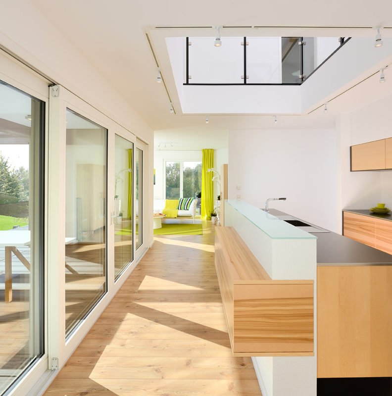 Haus Bad Vilbel - Eine Küche mit Holzboden - Design