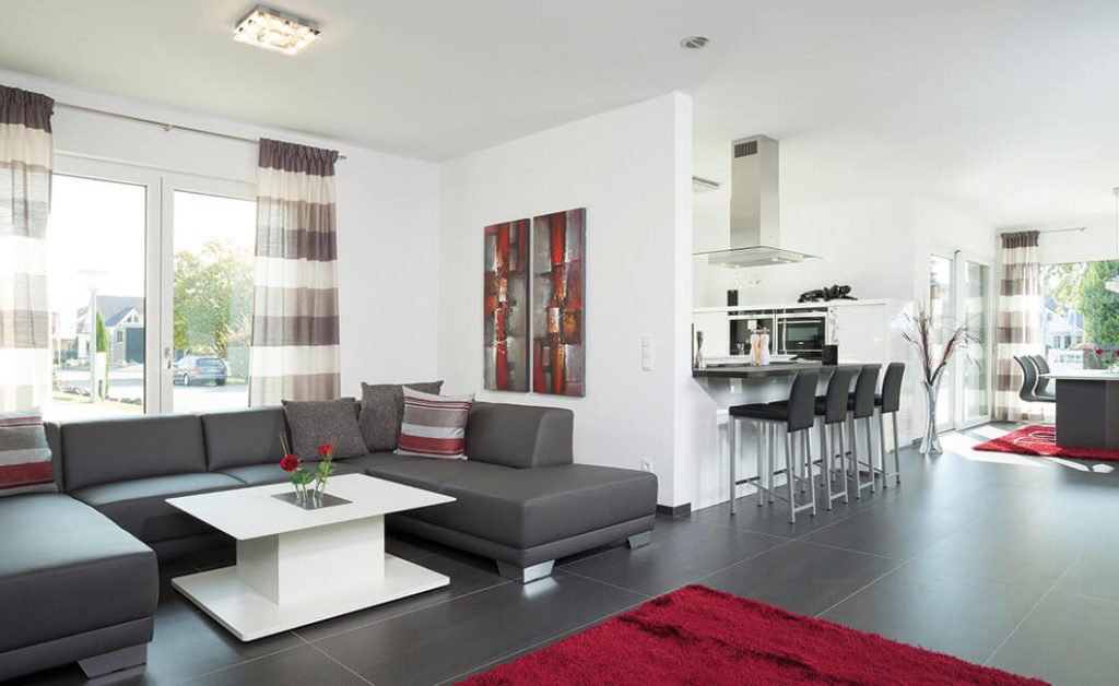 Edition Select 186 (Musterhaus Mannheim) - Ein Wohnzimmer mit Möbeln und einem großen Fenster - Interior Design Services