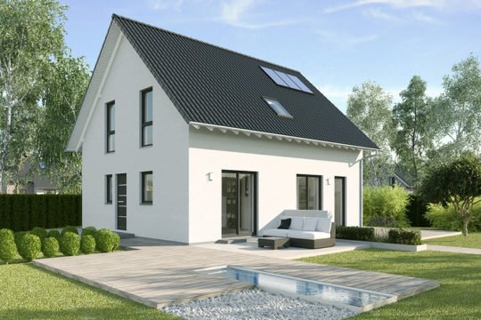 Valencia Kfw-Effizienzhaus 40 - Ein großes Backsteingebäude mit Gras vor einem Haus - Haus