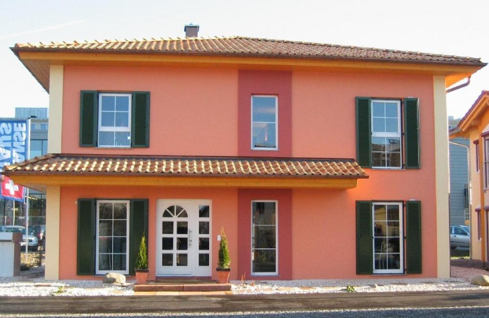 Musterhaus Tosca - Ein Haus vor einem Gebäude - Haus