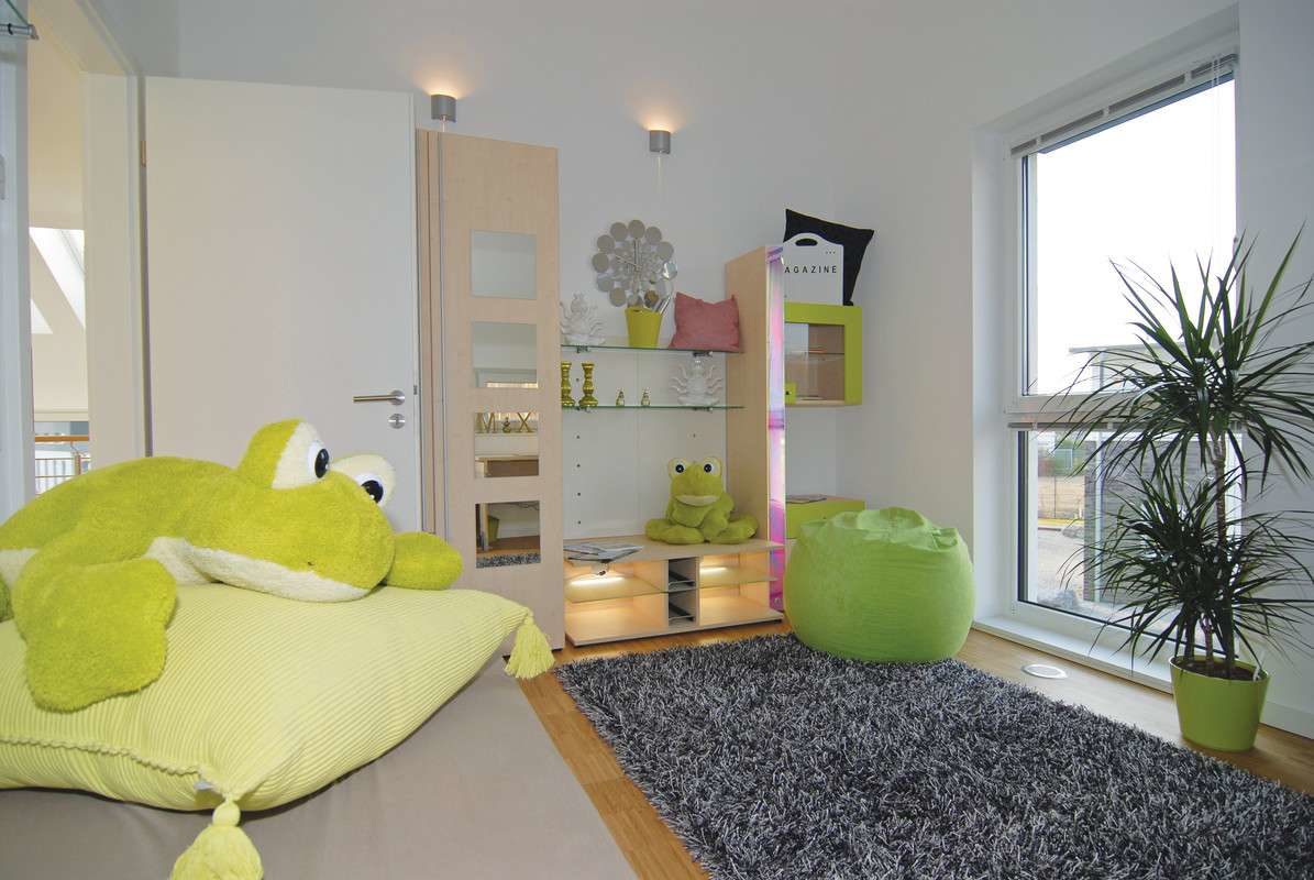 Musterhaus Köln - Ein Wohnzimmer voller Kuscheltiere - Interior Design Services