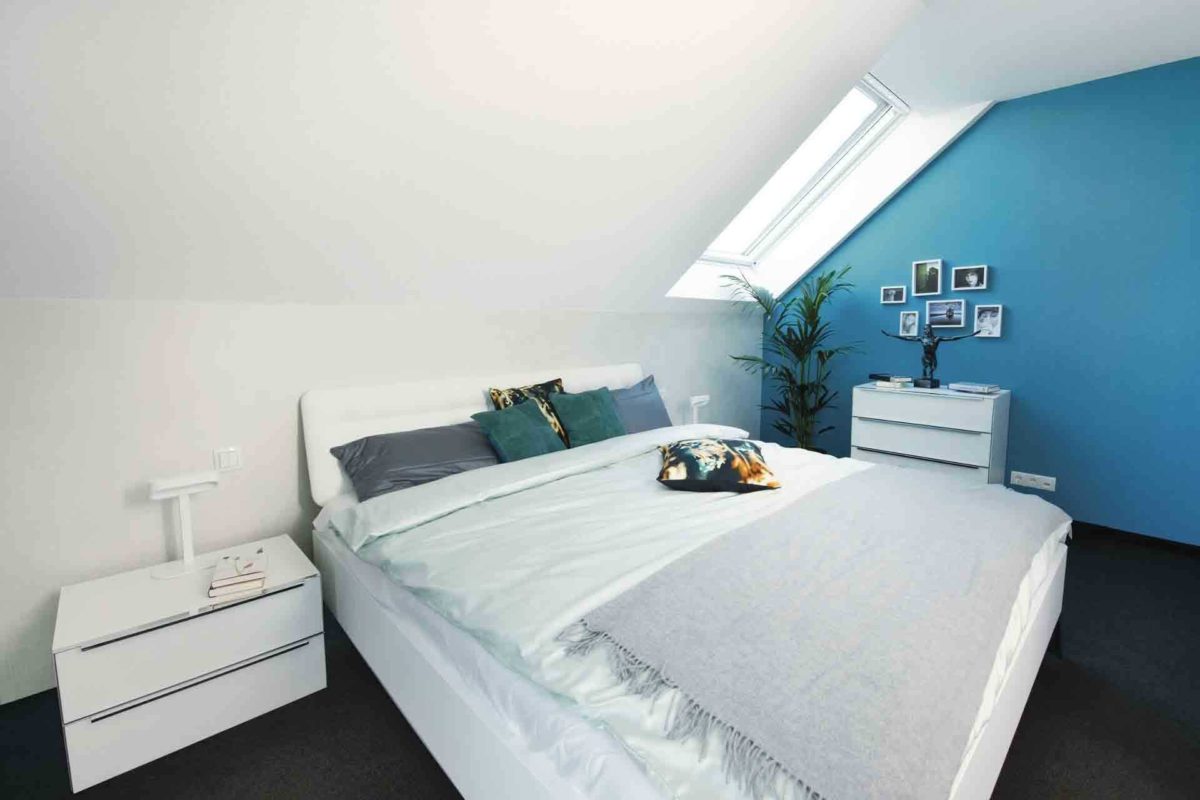 Musterhaus Balance 250 - Ein Schlafzimmer mit einem Bett in einem Raum - Schlafzimmer