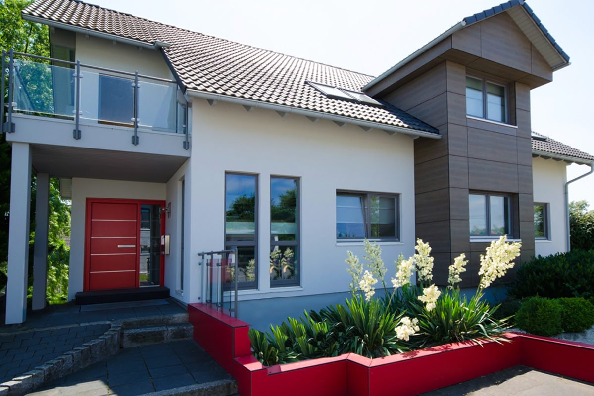 Musterhaus Streif - Ein Haus mit einem roten Backsteingebäude - Streif