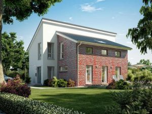 Automatisch gespeicherter Entwurf - Ein Haus mit Büschen vor einem Backsteingebäude - Musterhauszentrum Mülheim-Kärlich