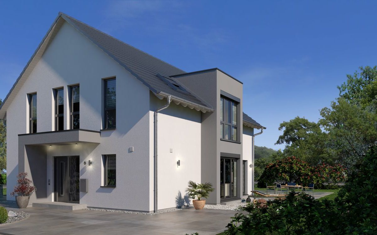 Musterhaus Ottendorf-Okrilla - Ein Haus mit Bäumen im Hintergrund - Haus