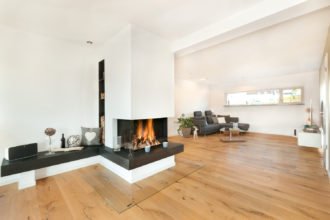 Haus U120 - Ein Blick auf ein Wohnzimmer mit Möbeln und einem Kamin - Interior Design Services