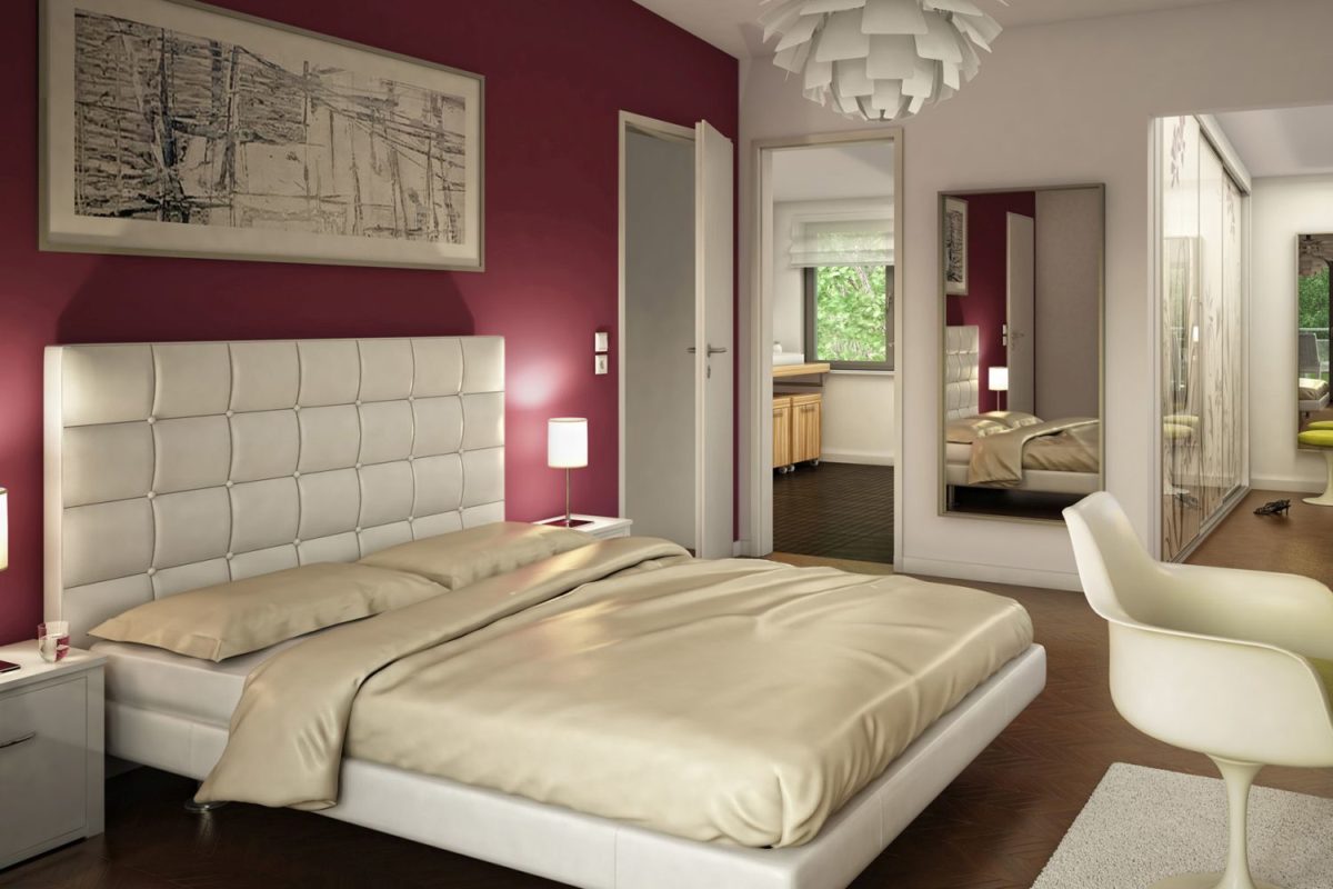 Automatisch gespeicherter Entwurf - Ein Schlafzimmer mit einem Bett und einem Schreibtisch in einem Hotelzimmer - Bien Zenker