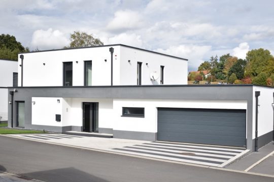 Hausbau Helden Massivhaus Rhein Lahn | Stylisches Flachdachhaus