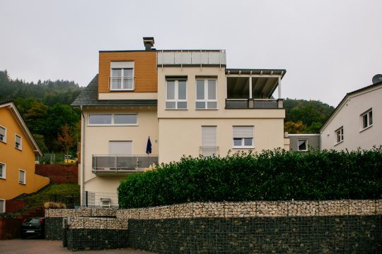 Hausbau Helden Massivhaus Rhein Lahn | Mehrfamilientraum am Hang