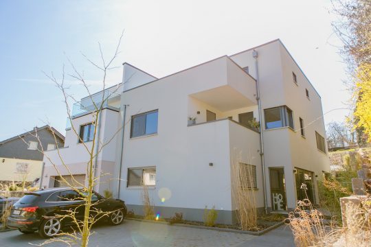 Hausbau Helden Massivhaus Rhein Lahn | Flachdachhaus am Hang