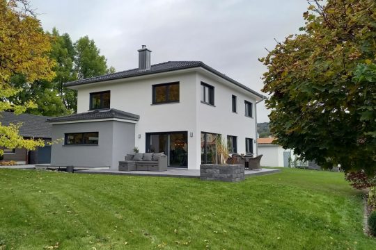 Wolf-Haus Kundenhaus Webe Außenansicht Garten